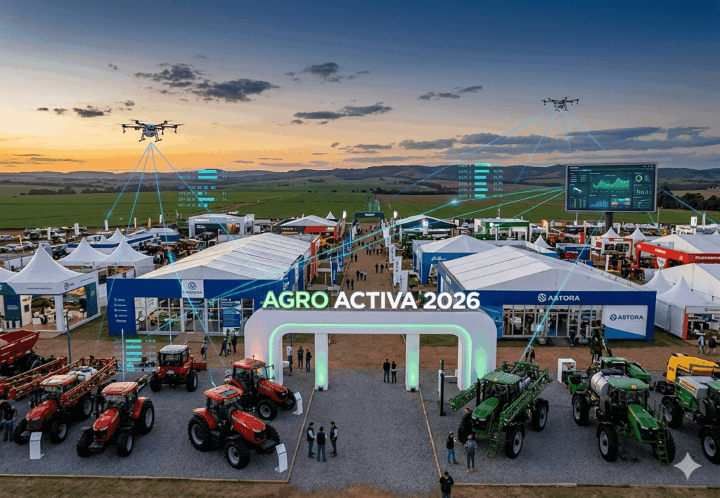 Vista panorámica de la feria AgroActiva 2026 con stands, maquinaria agrícola moderna, drones sobrevolando los lotes y gráficos digitales de telemetría y agricultura de precisión.